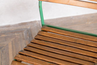 green-vintage-stacking-chairs-slatted-seat-close-up