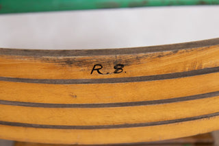 green-vintage-stacking-chairs-backrest-close-up-back-view