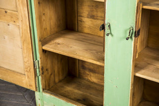 green storage cupboard