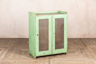 green storage cupboard