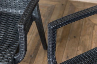 grey chairs with armss