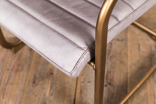 grey white dining chair with brass frame