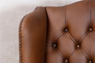 brown-leather-armchair-seat-back