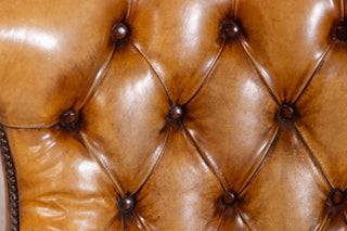 chesterfield-style-tan-armchair-close-up