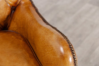 chesterfield-style-tan-armchair-close-up