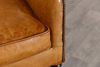 chesterfield-style-tan-armchair-close-up