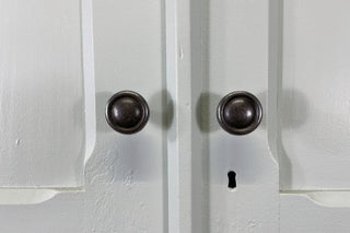 A Pair of Edwardian Matching Estate Cupboards