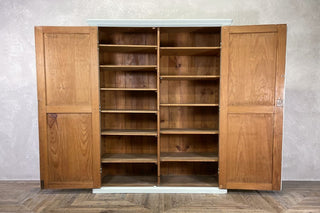 A Pair of Edwardian Matching Estate Cupboards