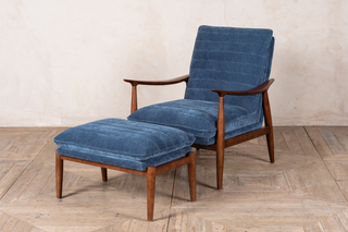blue-armchair-arm-with-stool