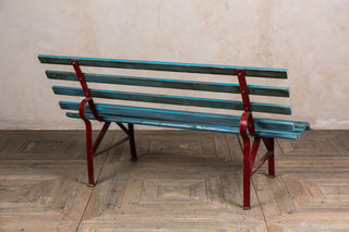 large blue railway bench