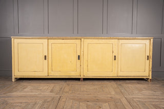 large wooden sideboard with sliding doors