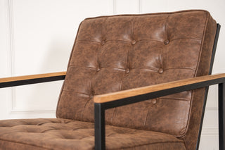 leather armchair with metal frame