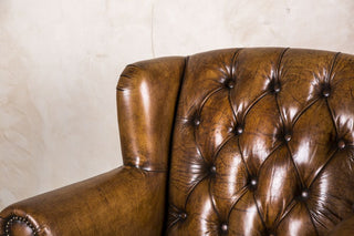 leather button back chair