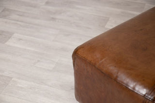 vintage-leather-footstool-pouf-corner