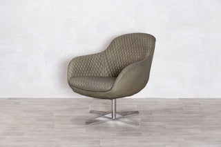 green-swivel-chair