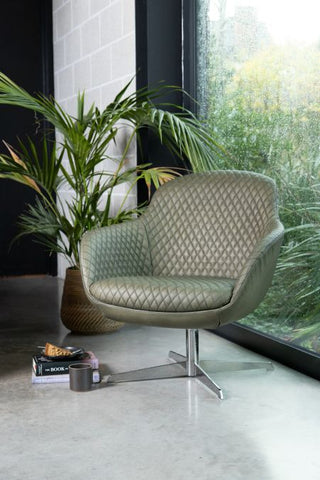green-armchair-in-home