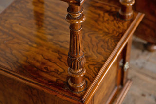 pair-of-walnut-marble-topped-bedside-tables-close-up