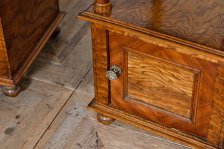pair-of-walnut-marble-topped-bedside-tables-close-up