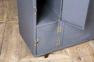 metal unit on wooden legs