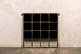 metal window framed mirror