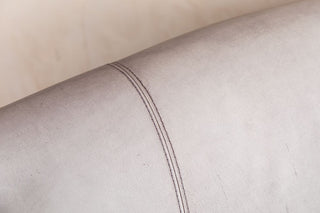 roxy-leather-sofa-light-concrete-backrest