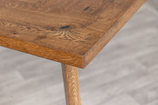 oak-tapered-table-with-dark-stained-oak-top-close-up