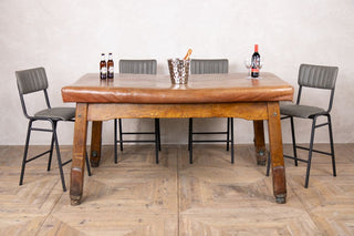 vintage-leather-top-dining-table