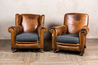 pair of vintage leather armchairs