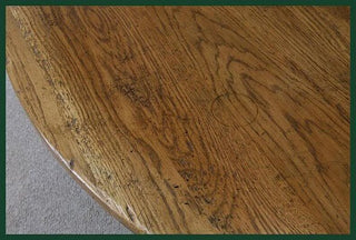 handmade bespoke solid oak oval extending table