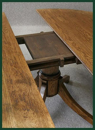 handmade bespoke solid oak oval extending table