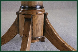 handmade bespoke solid oak oval extending table