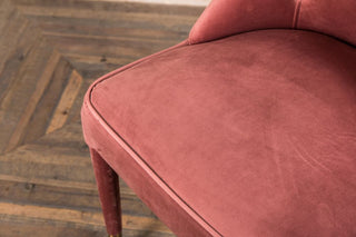 pink button back chair