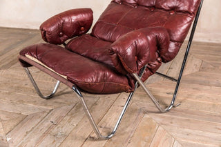 red upholstered armchair