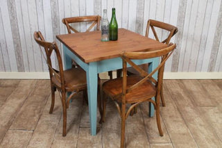 restaurant table with painted base