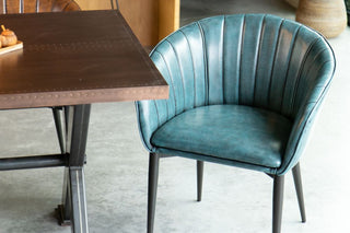 x-frame-dining-table-copper-top-lifestyle