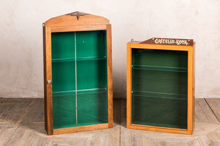 small and large glass cabinets