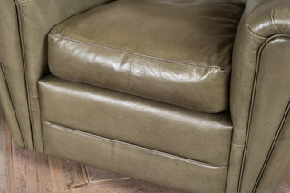 small green armchair