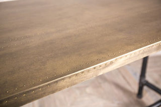 studded brass table