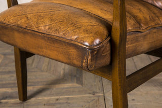 tan leather armchair seating