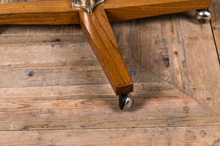 teak reclining winged armchair