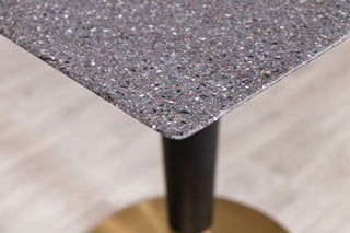dark-terrazzo-table-round-brass