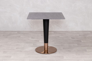 dark-terrazzo-table-round-copper