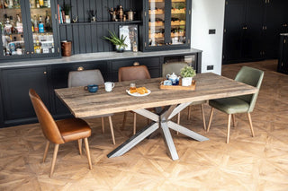 theron-leather-dining-chairs-around-table