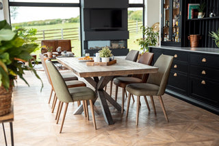 theron-leather-dining-chairs-around-table