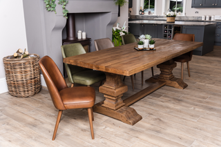 theron-leather-dining-chairs-around-table