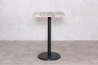 travertine-top-square-bar-table-round-base-close-up