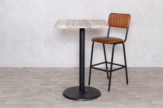 travertine-top-square-bar-table-round-base-close-up