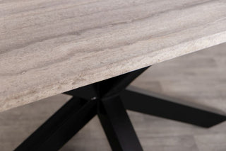 travertine-top-dining-table-black-star-base
