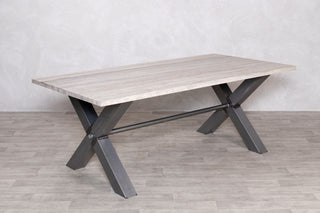 travertine-top-dining-table-gunmetal-x-frame-base