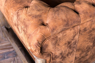 tufted leather sofa
